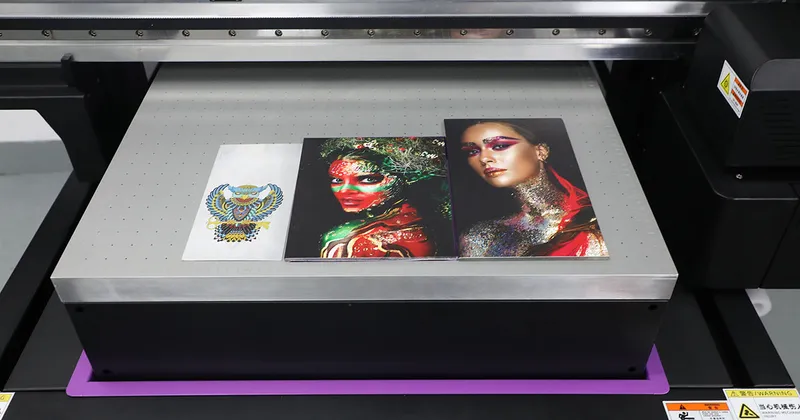 Megajet 6090 commercial UV flatbed printer printing high-resolution acrylic artwork and metal sign samples